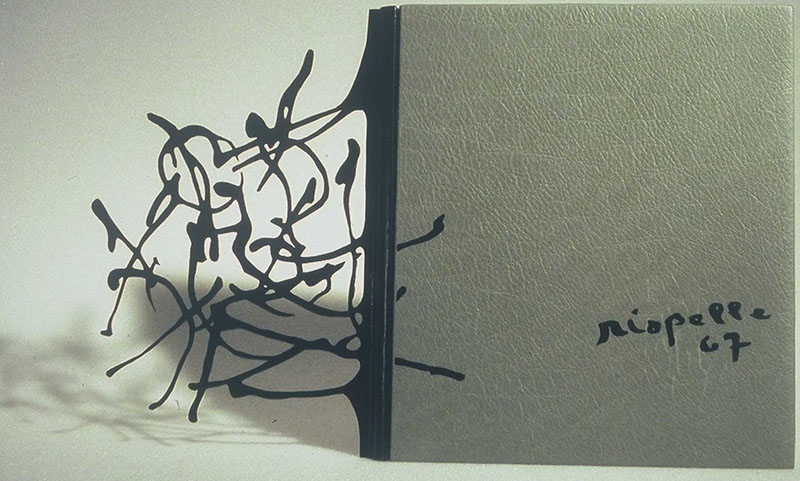 Full leather binding with a cut-out panel by Isabelle Poitras Full leather binding with a cut-out panel by Isabelle Poitras