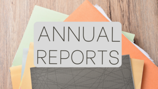 image of documents with the word Annual Reports overlaid